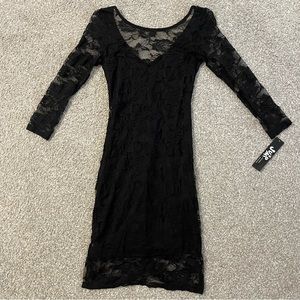 Jump black lace mini bodycon dress. Size 5/6.